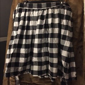 Black and white checked skirt.
